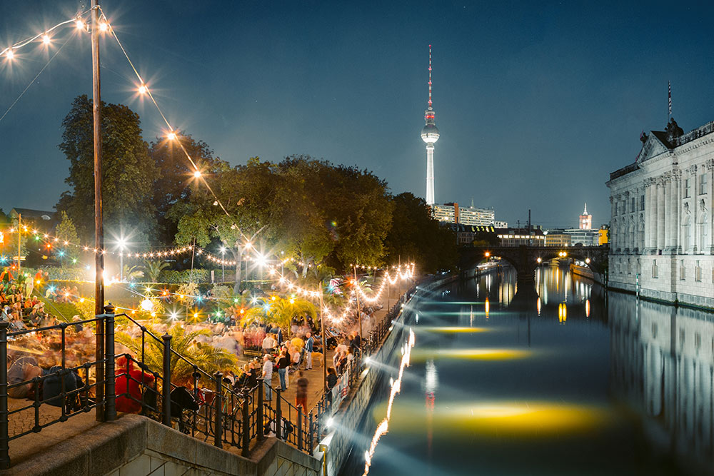 Berlin Strandbar party at Spree river with TV tower at night, Ge